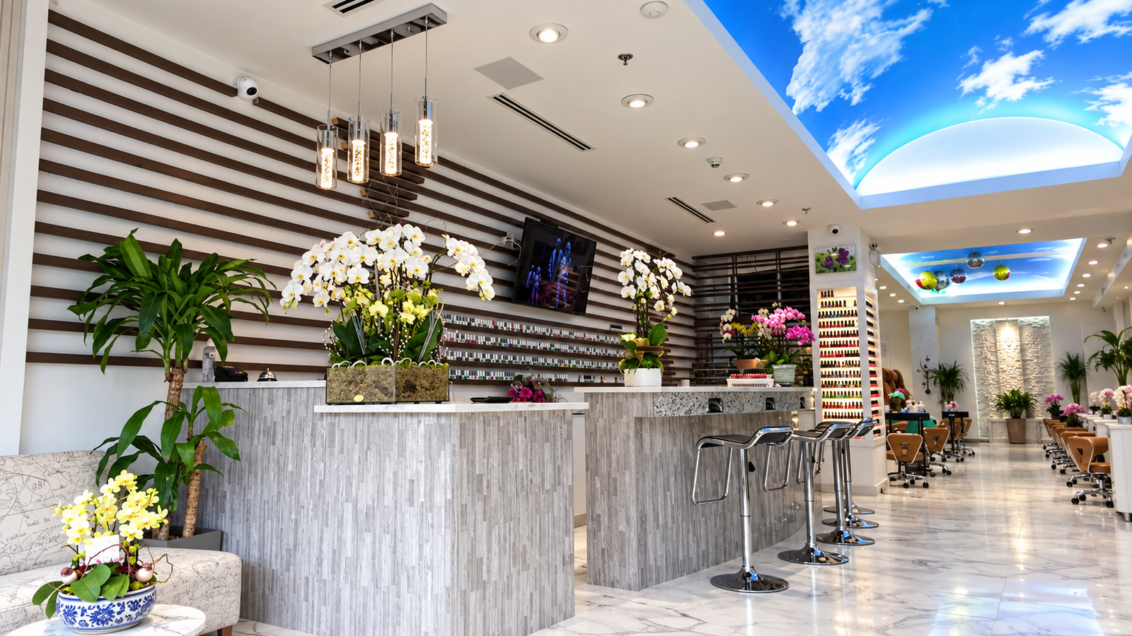 Reception with fresh orchids at Stanley Nails Vancouver